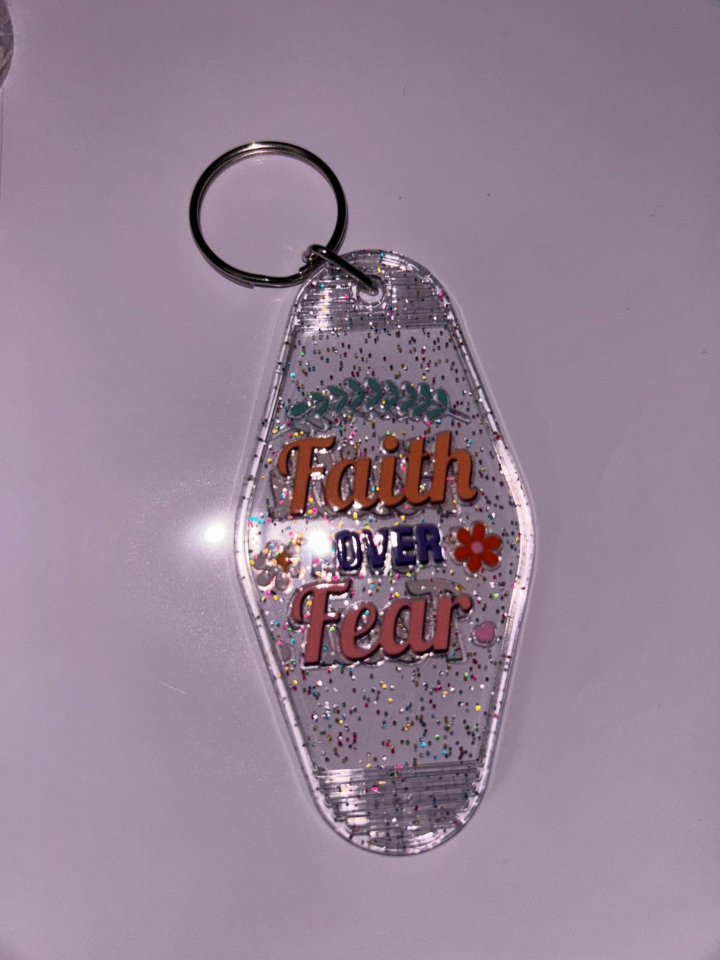 “Faith over fear” motel keychain