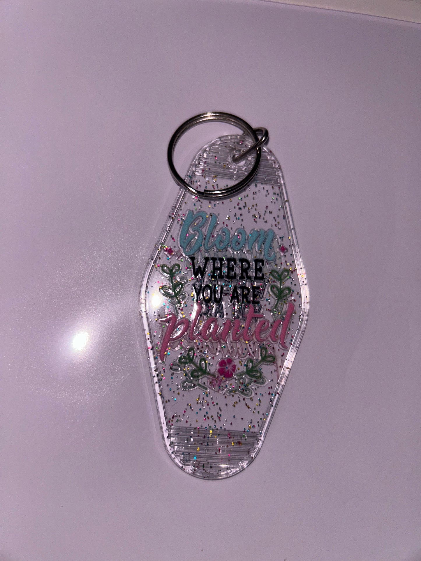 “Bloom where you are planted” keychain